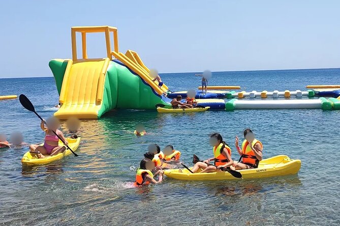 South Rhodes Inflatable Waterpark Ticket Kayak and SUP Rentals - A floating obstacle course with a small-scale feel