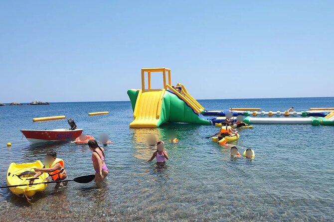 South Rhodes Inflatable Waterpark Ticket Kayak and SUP Rentals - A full day for about $12.04, with a few price details to check