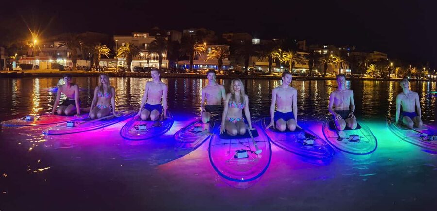 Split: Transparent SUP night Glow tour - Launching into the sea at dusk