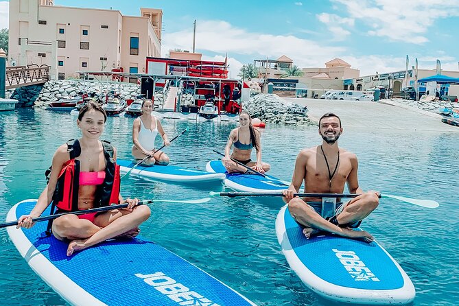 Stand Up Paddle Board 1h + cafe @POPEYE JETSKI in Dubai - Getting on the water at Jumeirah Beach