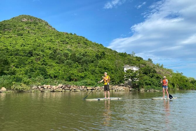 Stand Up Paddle Boarding and Sunset Watching on Cai River - Small local touches from Nguyen and Tu