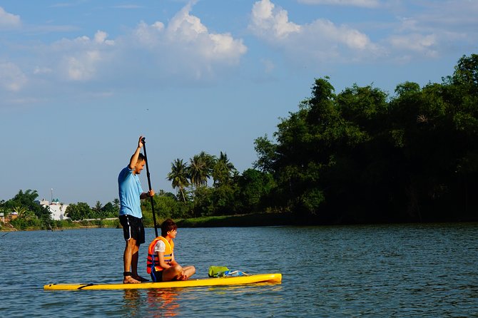 Stand Up Paddle Boarding and Sunset Watching on Cai River - Who should book this river outing