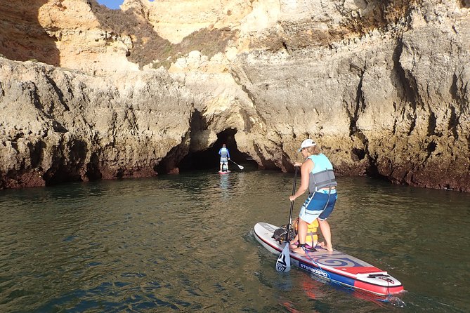 Stand Up Paddle Sunrise Caves Tour in Lagos - pickup Aljezur area - Paddling through arches and ocean-carved passages