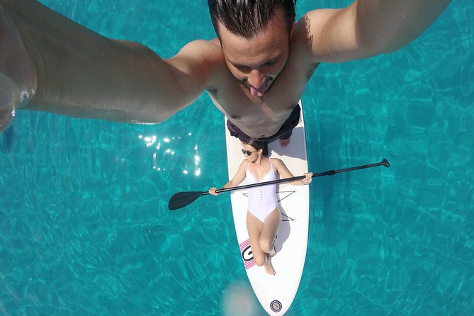 Stand Up Paddle (SUP) board rental - Learning the board before leaving the bay