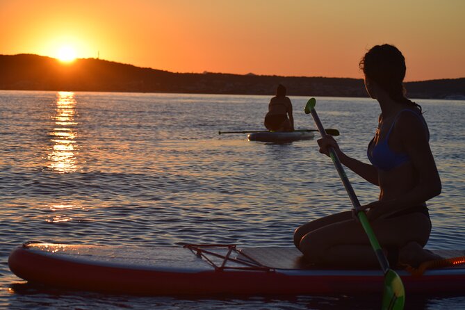 Stand Up Paddle With Dolphins, aperitif and pictures - Guides, photos, and the personal touch