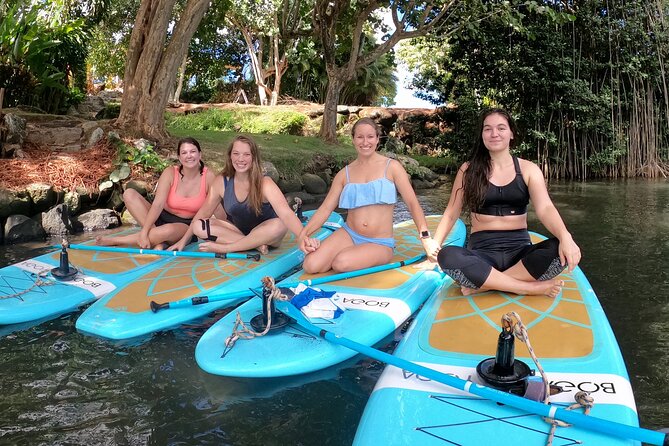 Stand-Up Paddle Yoga on the North Shore of Oahu - A floating yoga studio near Haleiwa
