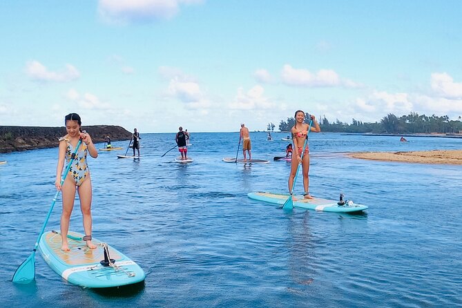 Stand-Up Paddle Yoga on the North Shore of Oahu - Restorative poses and a long exhale