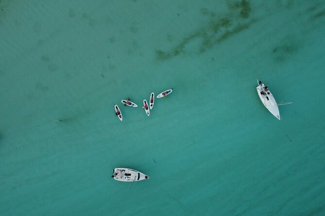 Sunrise on Paddleboard with breakfast in the lagoon of 7 colors - Breakfast with coffee and fruit on the board