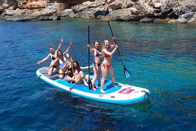 Sunset Cruise VIP (snorkeling, paddle board, & drinks Included) - Punta Galera trades sand for smooth rock