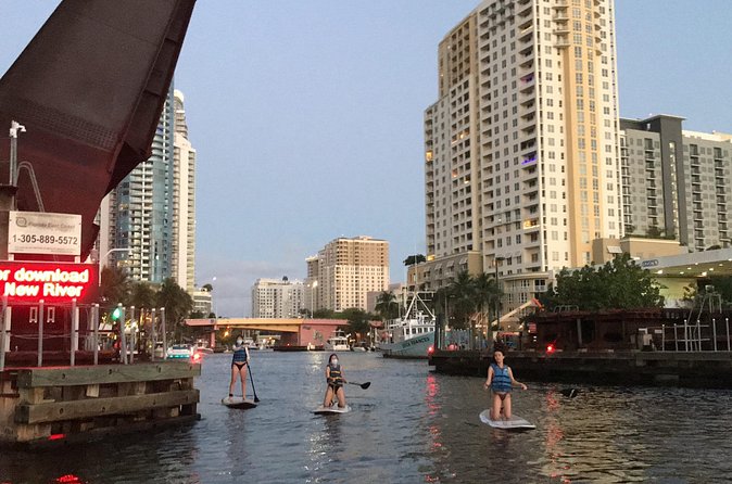 Sunset on Paddleboard Experience in Las Olas Fort Lauderdale - Sunset, music, beer, and city atmosphere