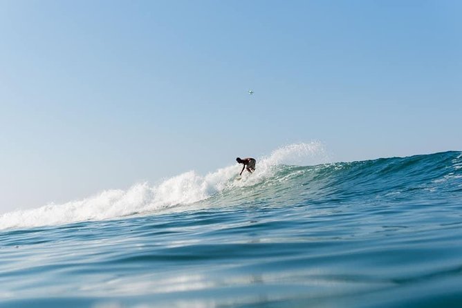 Surf Classes in Puerto Escondido - Boards, clothing, water, and sun protection
