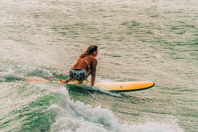 Surf in Vietnam with a local! - Taking the soft-top longboard into the water