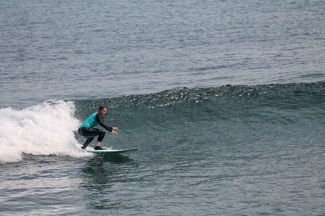 Surf Lesson Gili Trawangan - Equipment, wetsuit, and reef shoes
