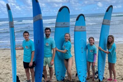 Surfing lesson at beautiful beach Playa Encuentro