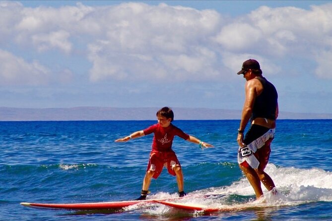 Surfing Waikiki with local Firefighters - Meeting at the Duke statue