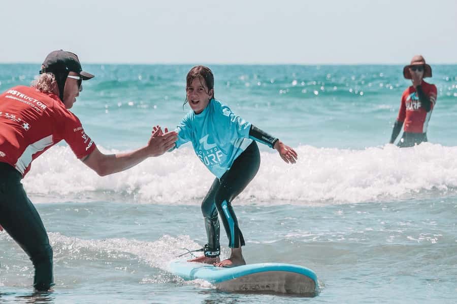 Tel Aviv: Professional Surfing Lessons at Beach Club TLV - One hour on the Mediterranean