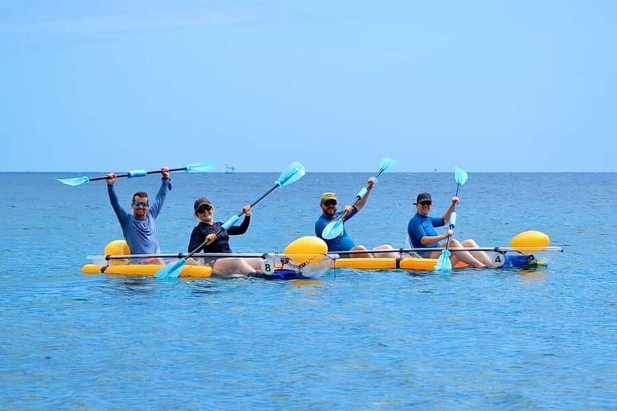 Transparent kayak and stand up paddle rental - Seeing Amed through a clear kayak