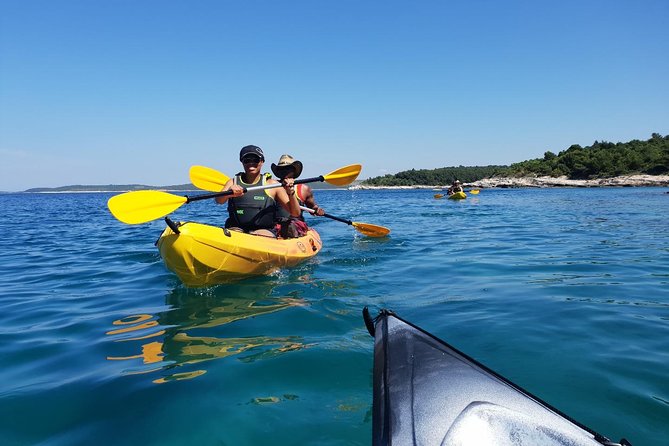TRANSPARENT KAYAKING or SUP-ing AROUND ISLANDS - Paddling toward the islands of Kamenjak