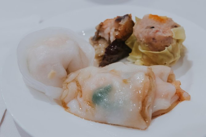Under the Surface of Montreal's Chinatown: Guided Food Walking Tour - From Place d’Armes into Chinatown
