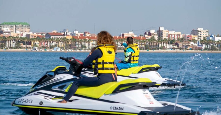 Valencia: Jet Ski Tour + Paddle Surf + Photos + Free drink - Riding across Valencia Bay