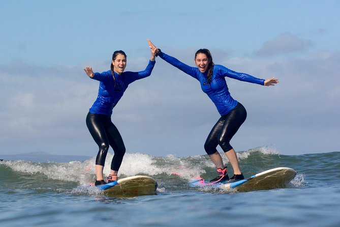 Waves Hawaii Surf School in Kihei Maui - Into the water: catching your first ride