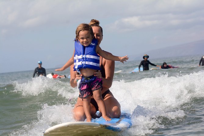 Waves Hawaii Surf School in Kihei Maui - Getting fitted with a rash guard, shoes, and board